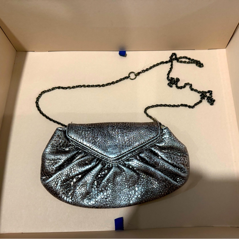 Lauren Merkin metallic clutch with strap